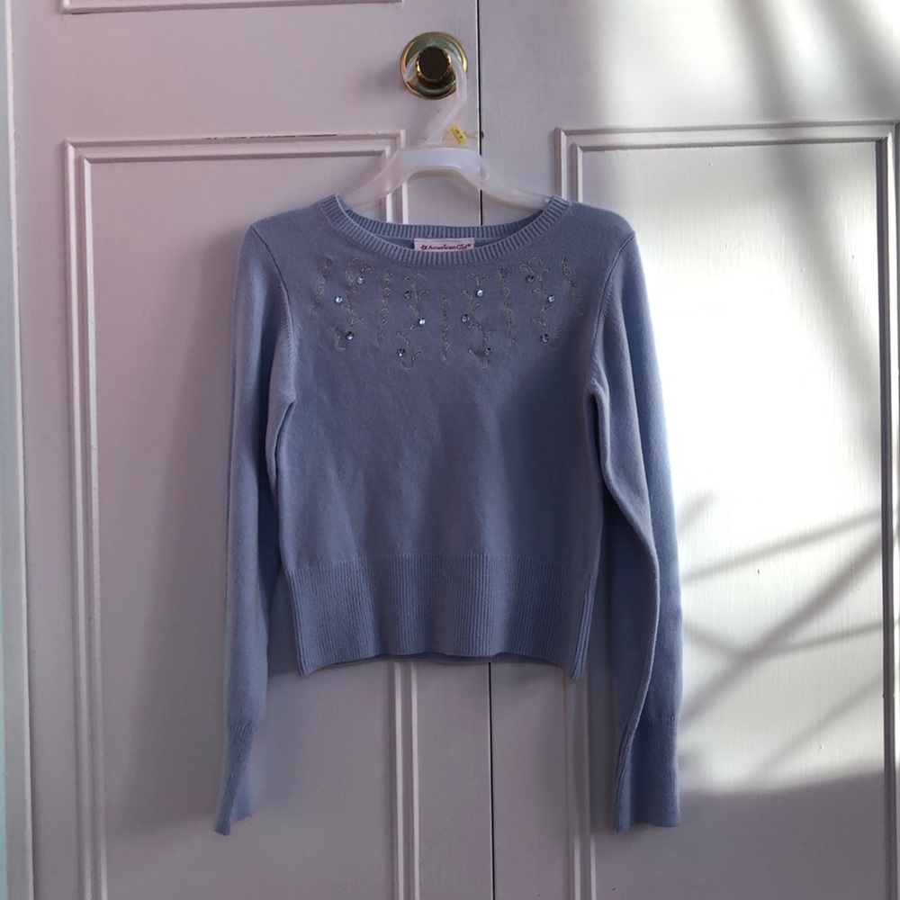 Light blue sweater